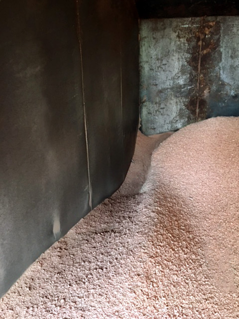 Dumpster Filled with Wood Dust
