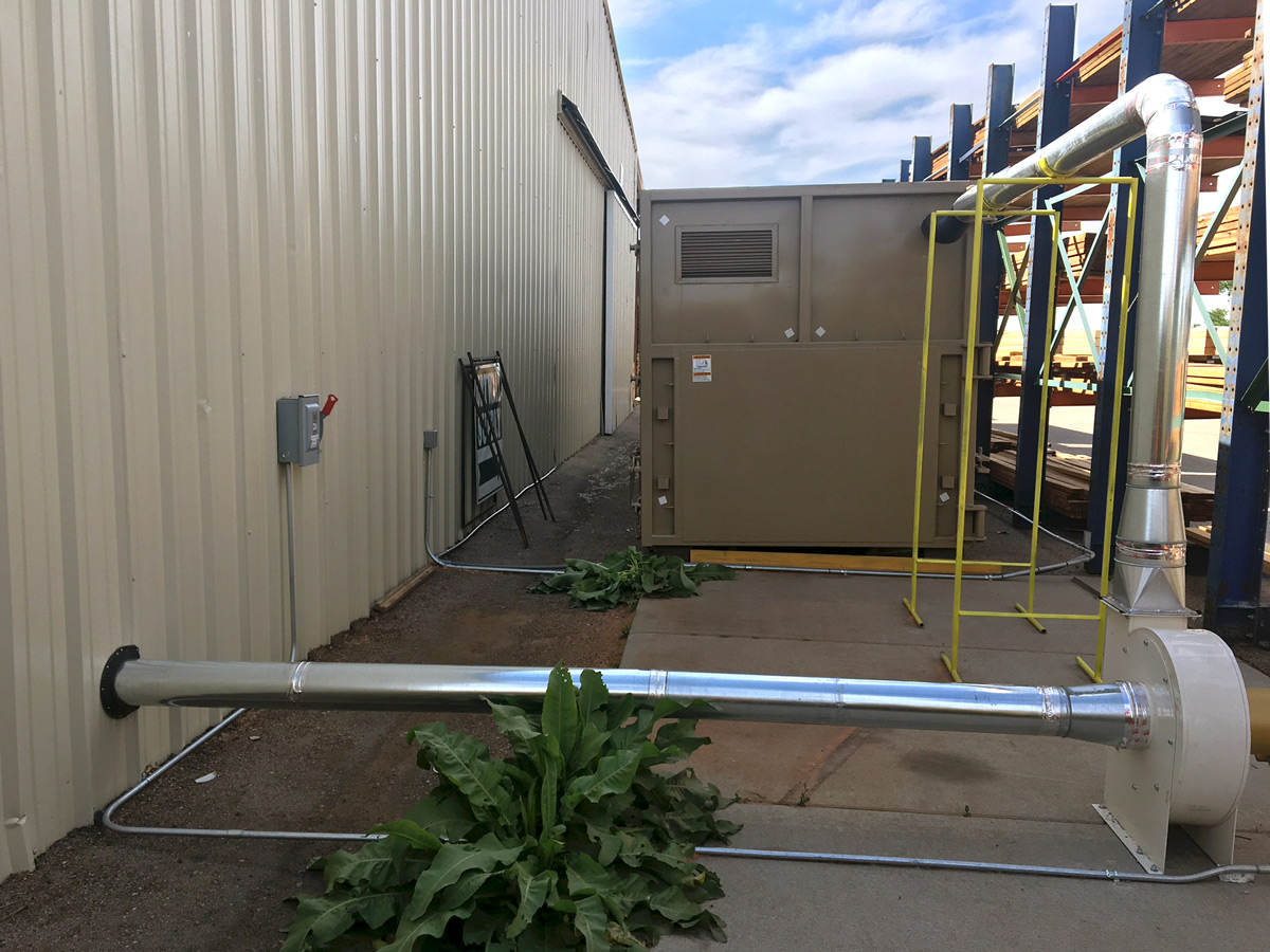 Transfer Blower Conveying Dust to Dumpster Outside