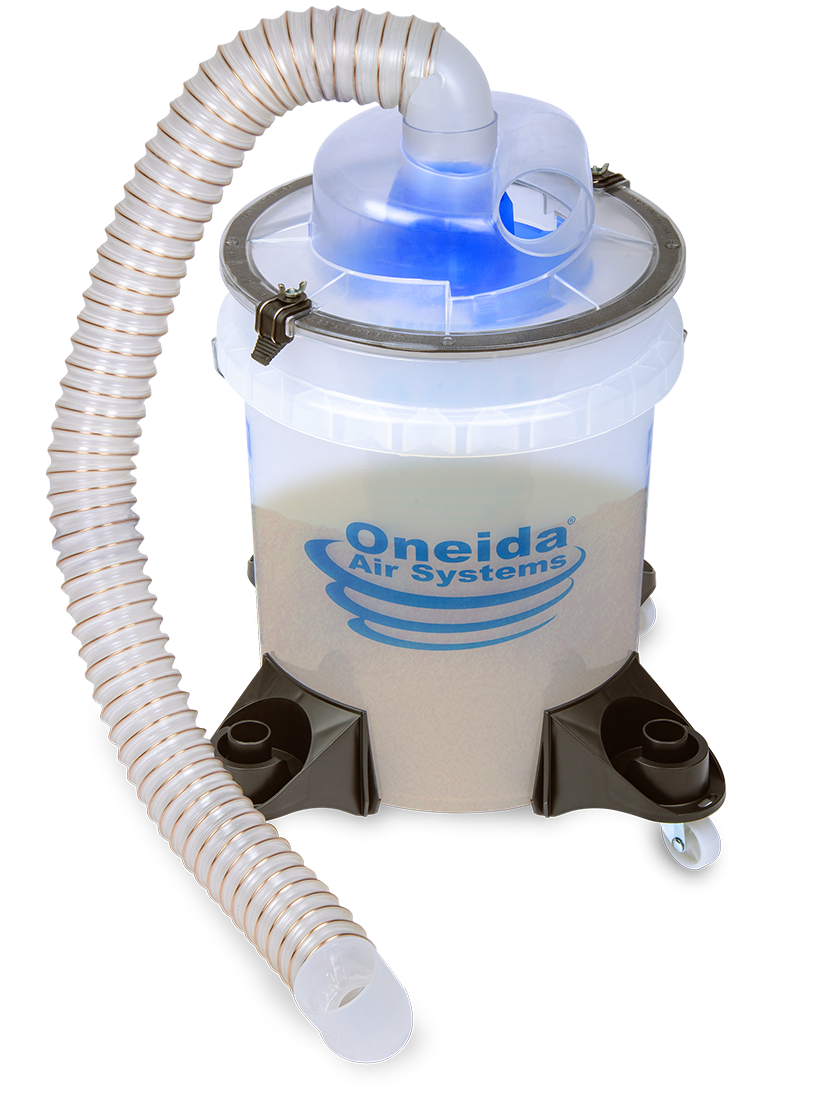 Upper angled view of the assembled Dust Deputy Low Pro Deluxe Kit with its 5-gallon bucket half full of dust.