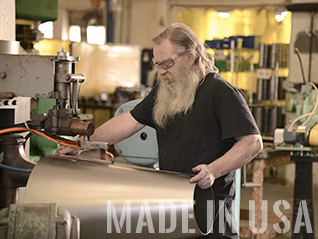 An Oneida Air worker artfully welds a new cyclone body