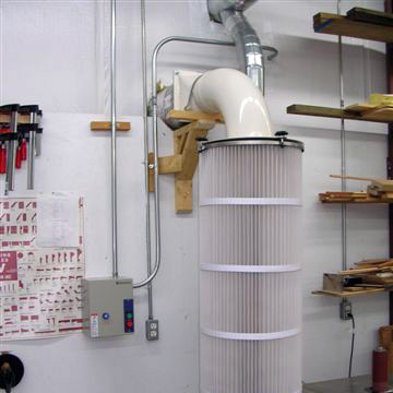 Filter plenum located inside the shop to ensure that conditioned air is maintained within the shop.